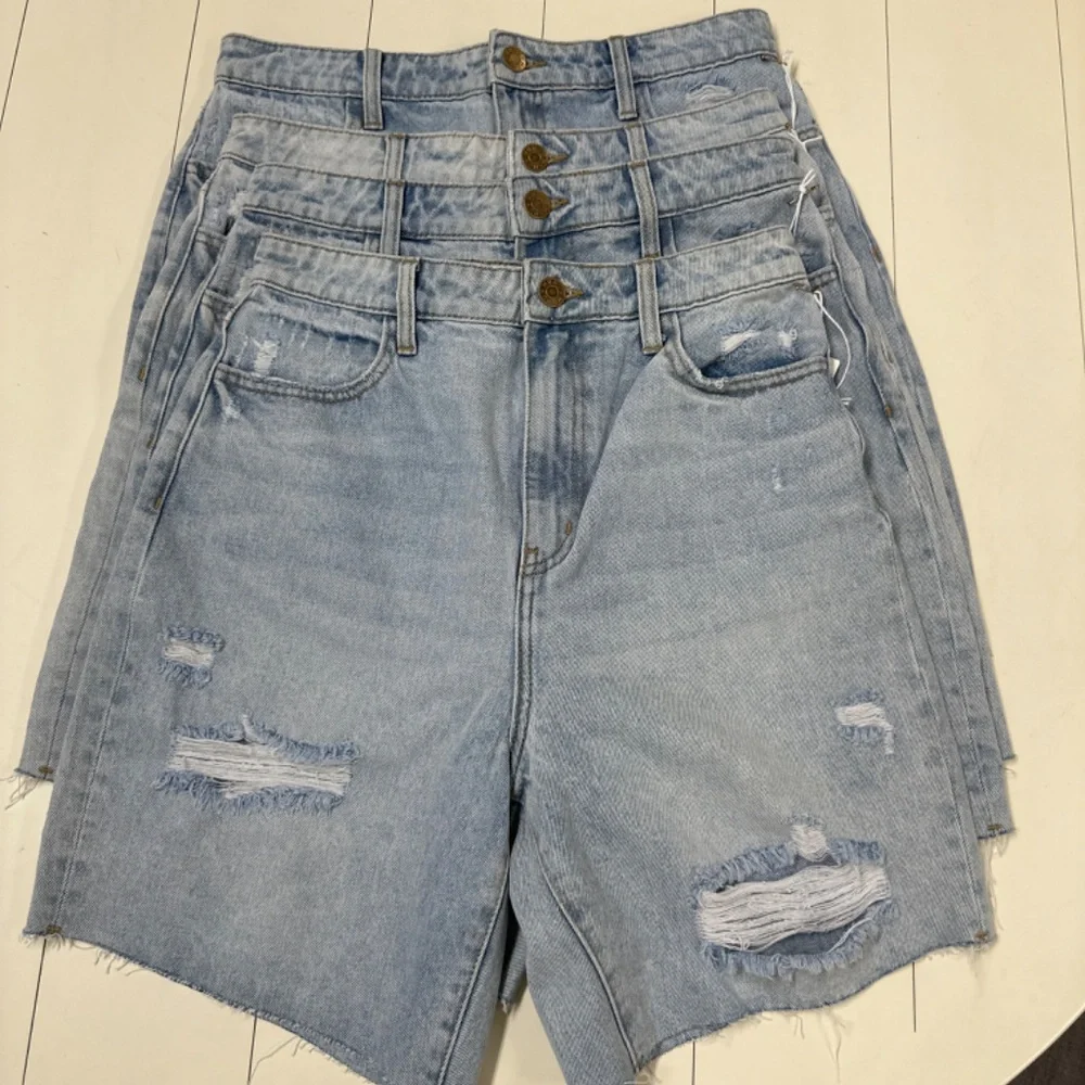 Long Denim distressed Denim shorts